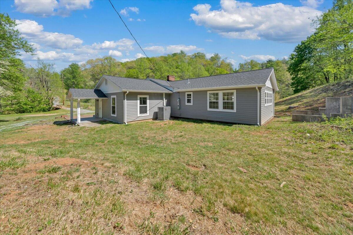 112 Frankie Lane Stuart, VA 24171 - Photo 49 of 57 a house with yard in front of it