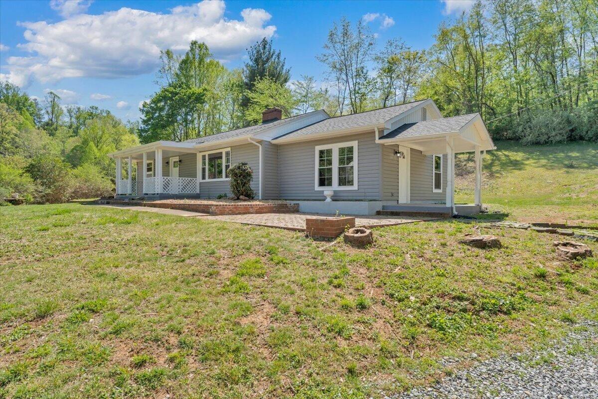 112 Frankie Lane Stuart, VA 24171 - Photo 52 of 57 a house view with a garden space