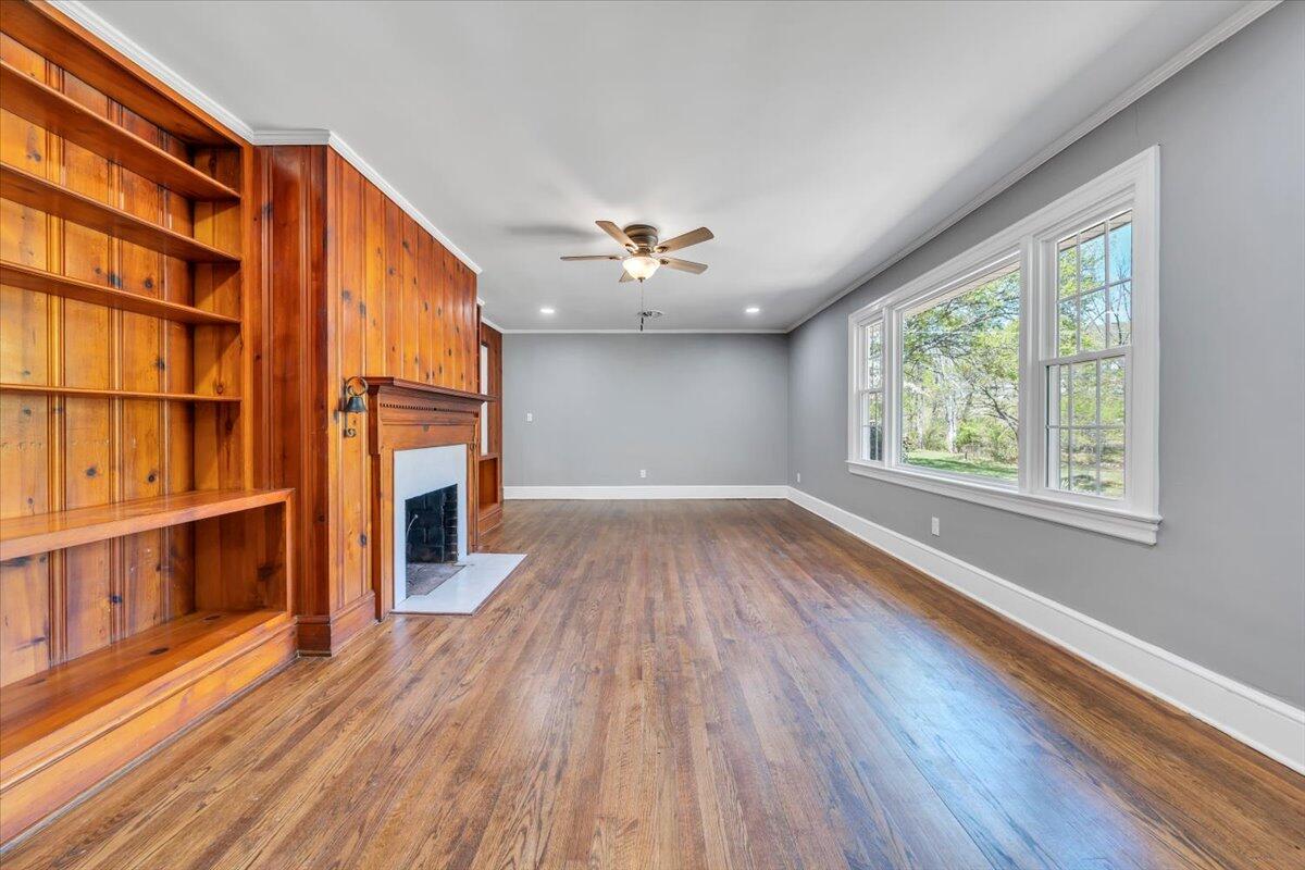 112 Frankie Lane Stuart, VA 24171 - Photo 6 of 57 wooden floor in an empty room with a window