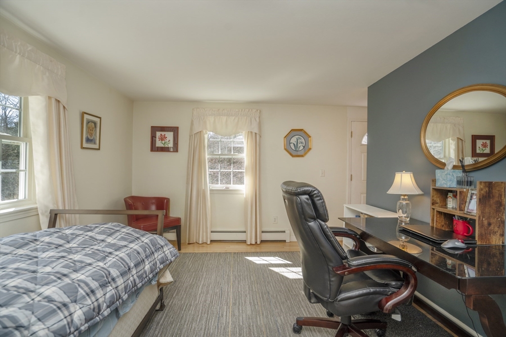 22 Elizabeth Street Amesbury, MA 01913 - Photo 12 of 38 a bedroom with bed and a large window