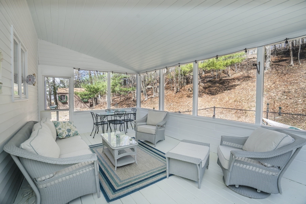 22 Elizabeth Street Amesbury, MA 01913 - Photo 25 of 38 a living room with furniture and a large window