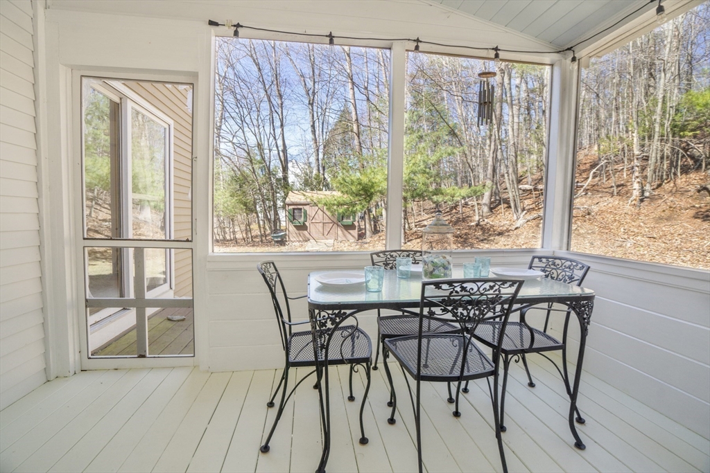 22 Elizabeth Street Amesbury, MA 01913 - Photo 26 of 38 a view of a dining room with furniture window and outside view