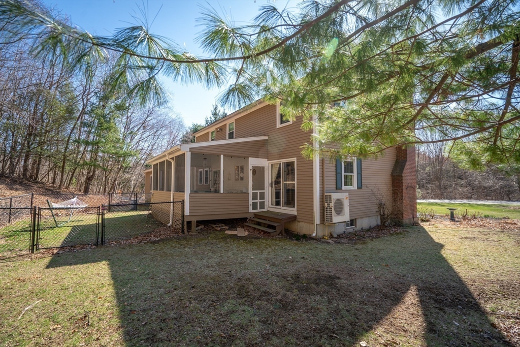 22 Elizabeth Street Amesbury, MA 01913 - Photo 29 of 38 a view of a house with a yard