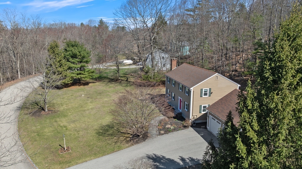 22 Elizabeth Street Amesbury, MA 01913 - Photo 34 of 38 a aerial view of a house with a yard and large tree