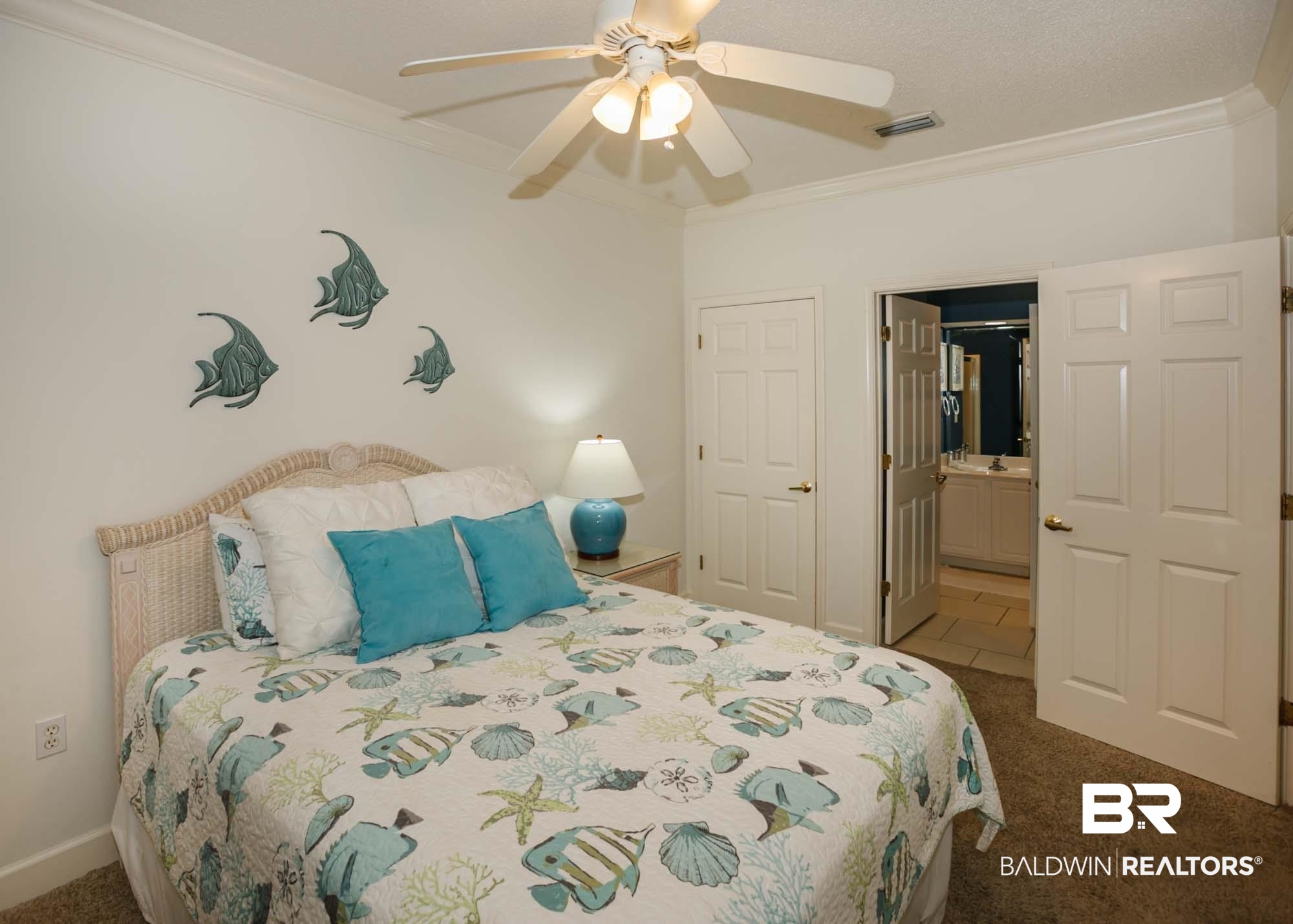 28910 Perdido Beach Boulevard, Unit 4B Orange Beach, AL 36561 - Photo 27 of 48 Bedroom featuring visible vents, carpet, ornamental molding, and a ceiling fan