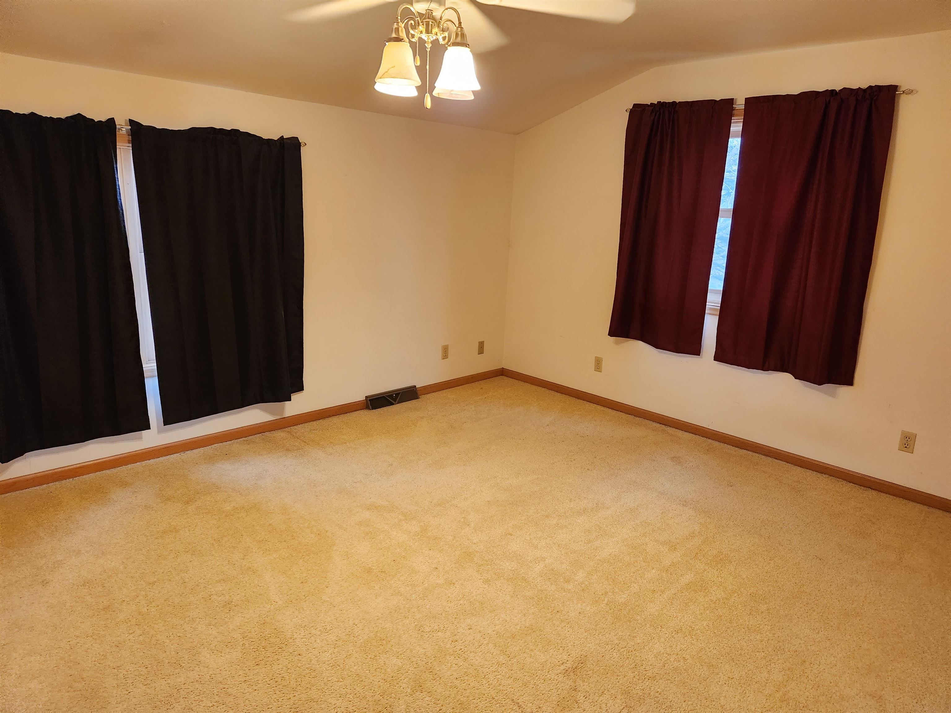 7082 South Hoosier Road Ashton, IL 61006 - Photo 35 of 48 a view of an empty room with wooden floor and cabinet