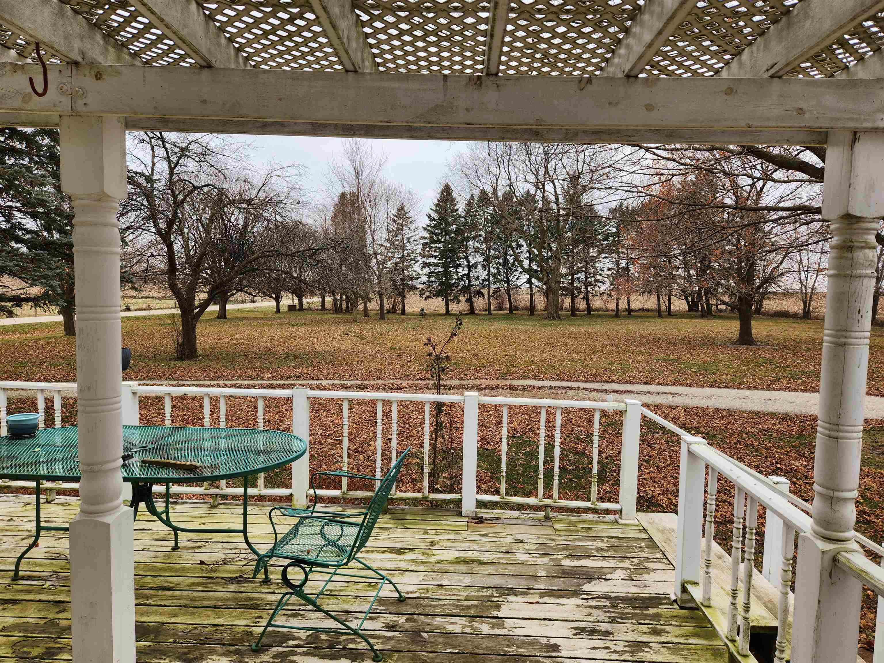 7082 South Hoosier Road Ashton, IL 61006 - Photo 45 of 48 a view of a chairs and table in the balcony
