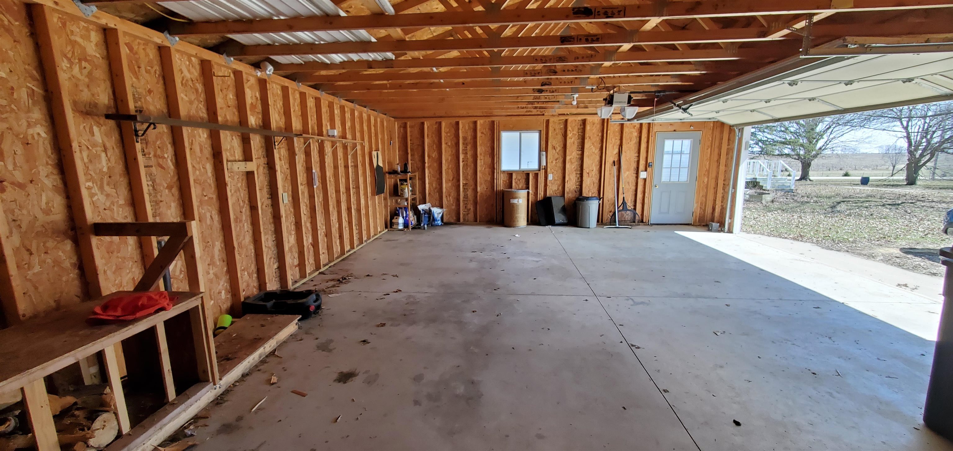 7082 South Hoosier Road Ashton, IL 61006 - Photo 47 of 48 a view of an empty room with wooden floor