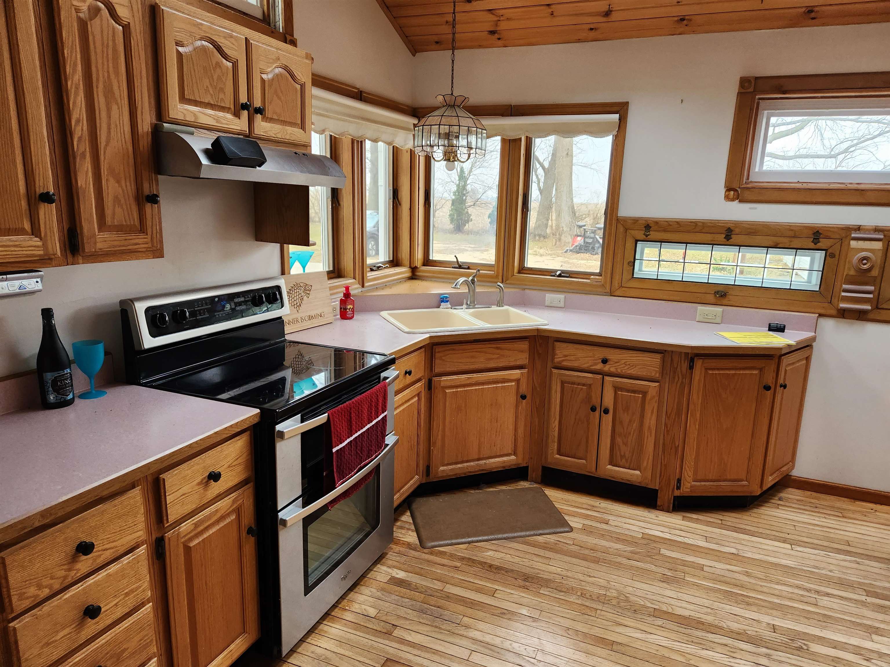 7082 South Hoosier Road Ashton, IL 61006 - Photo 7 of 48 a kitchen that has a sink and a stove
