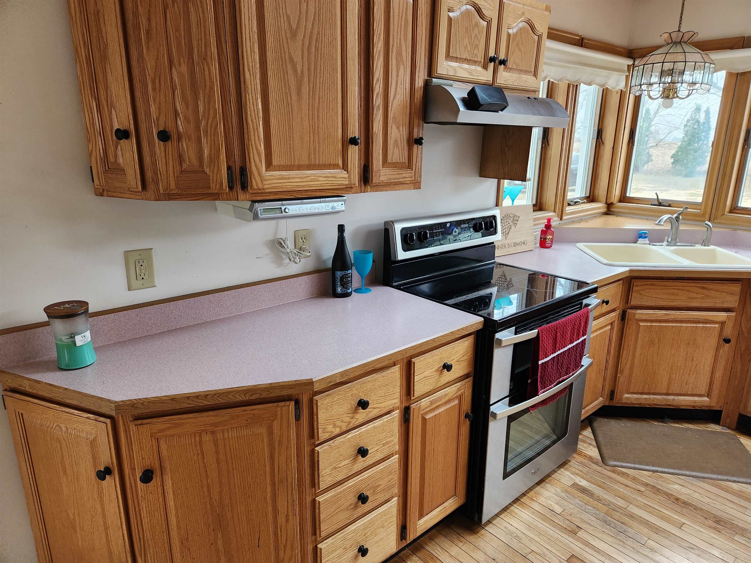 7082 South Hoosier Road Ashton, IL 61006 - Photo 8 of 48 a kitchen with stainless steel appliances a sink and cabinets