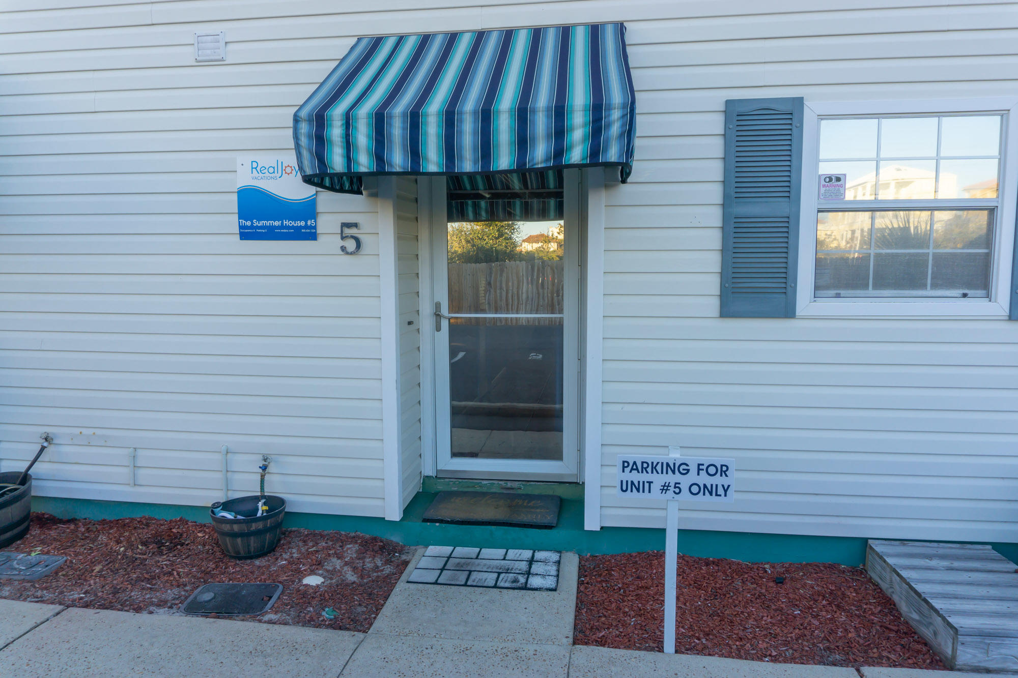 a sign on the side of a brick building