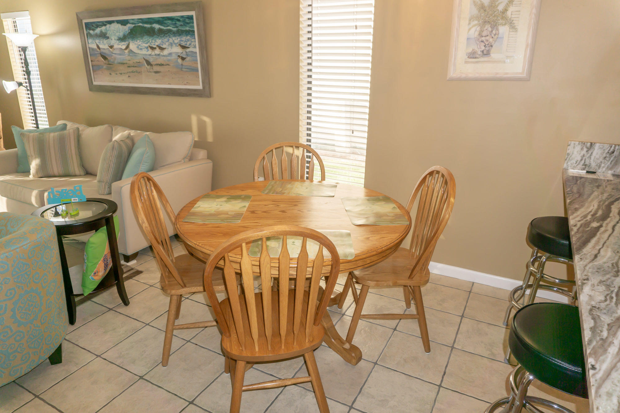 2000 Scenic Gulf Drive, Unit 5 Miramar Beach, FL 32550 - Photo 18 of 54 a view of a dining room with furniture and a window