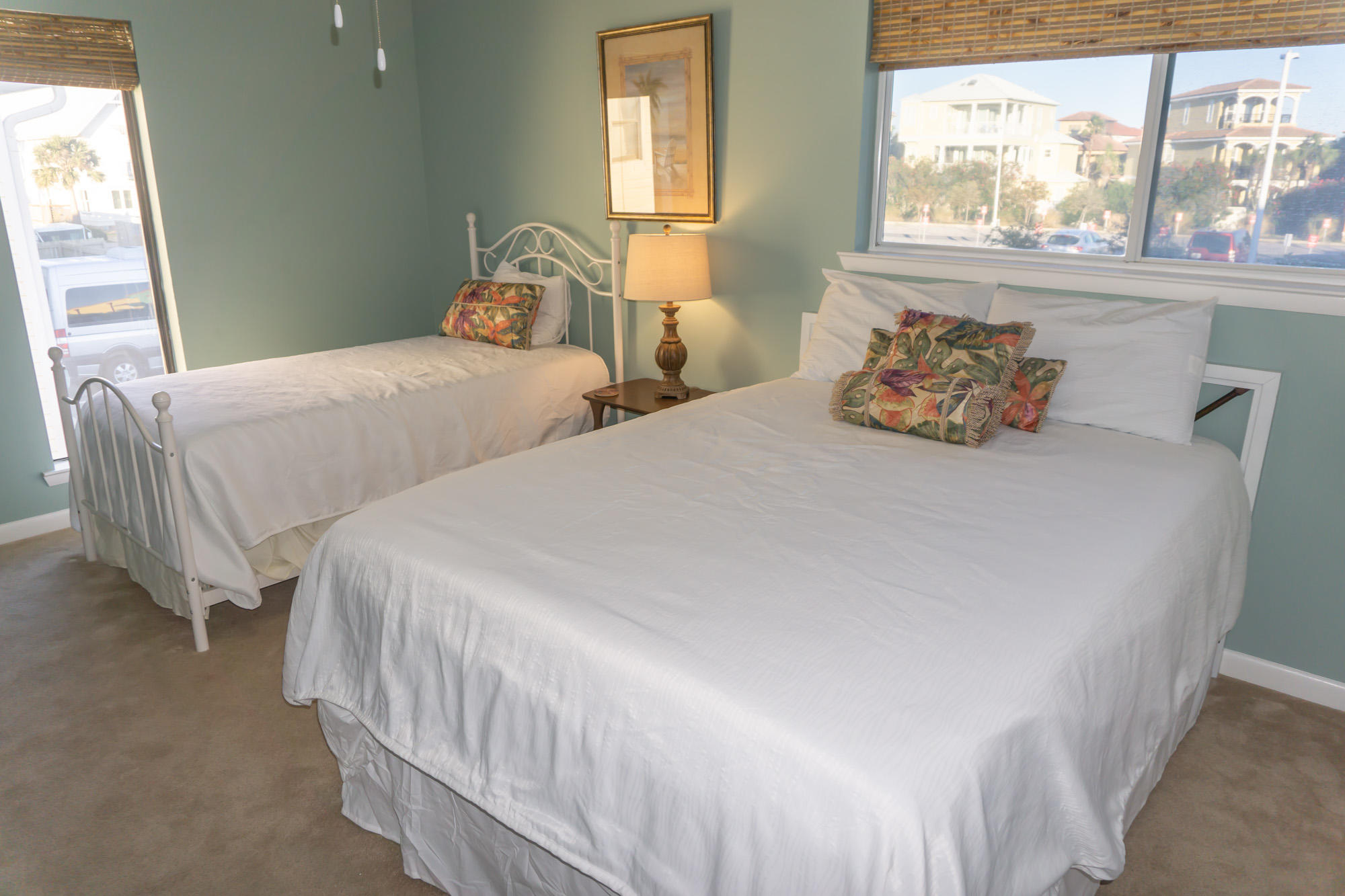 2000 Scenic Gulf Drive, Unit 5 Miramar Beach, FL 32550 - Photo 26 of 54 a bedroom with two beds and a large window