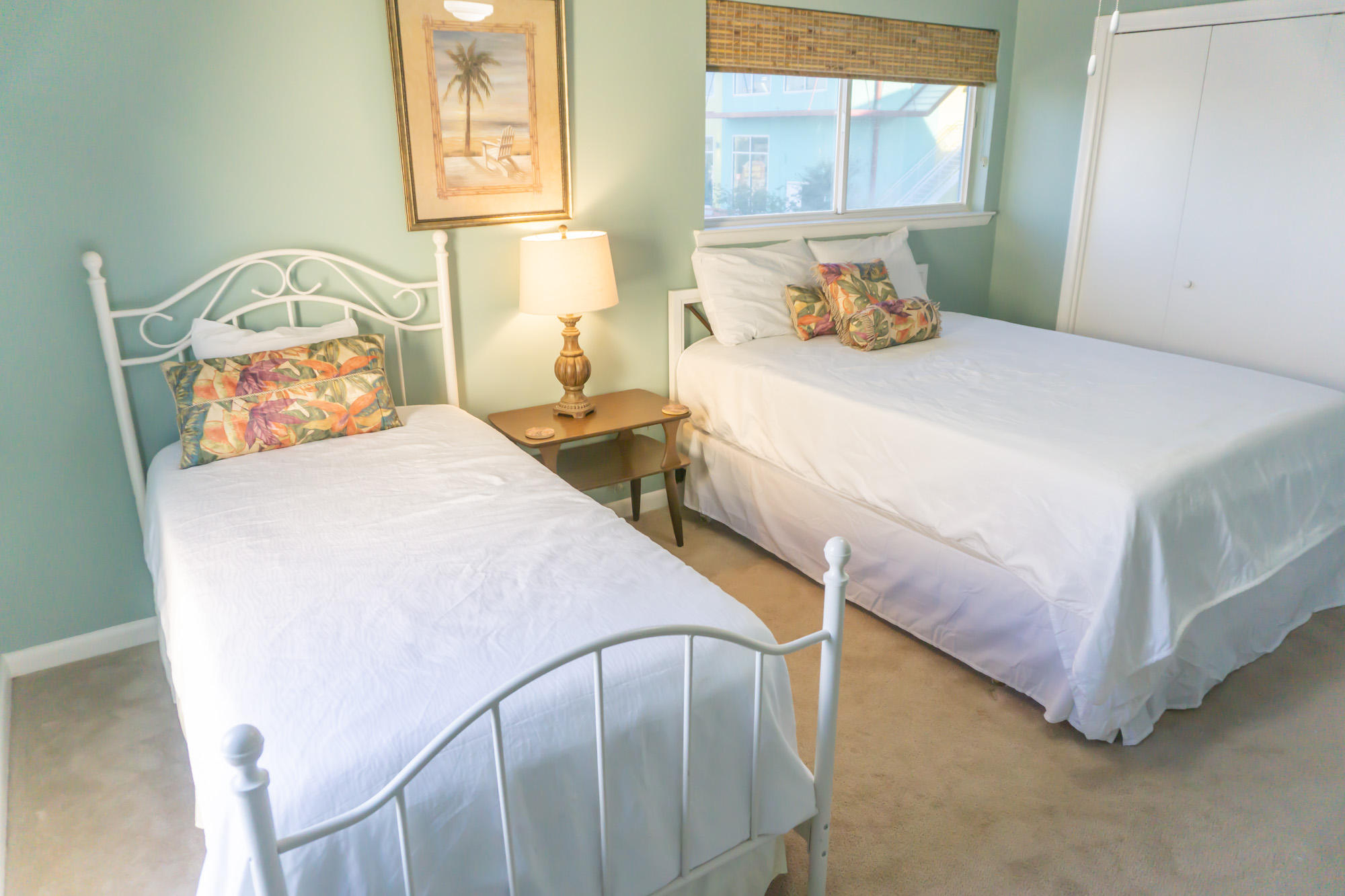 2000 Scenic Gulf Drive, Unit 5 Miramar Beach, FL 32550 - Photo 29 of 54 a bedroom with two beds and window