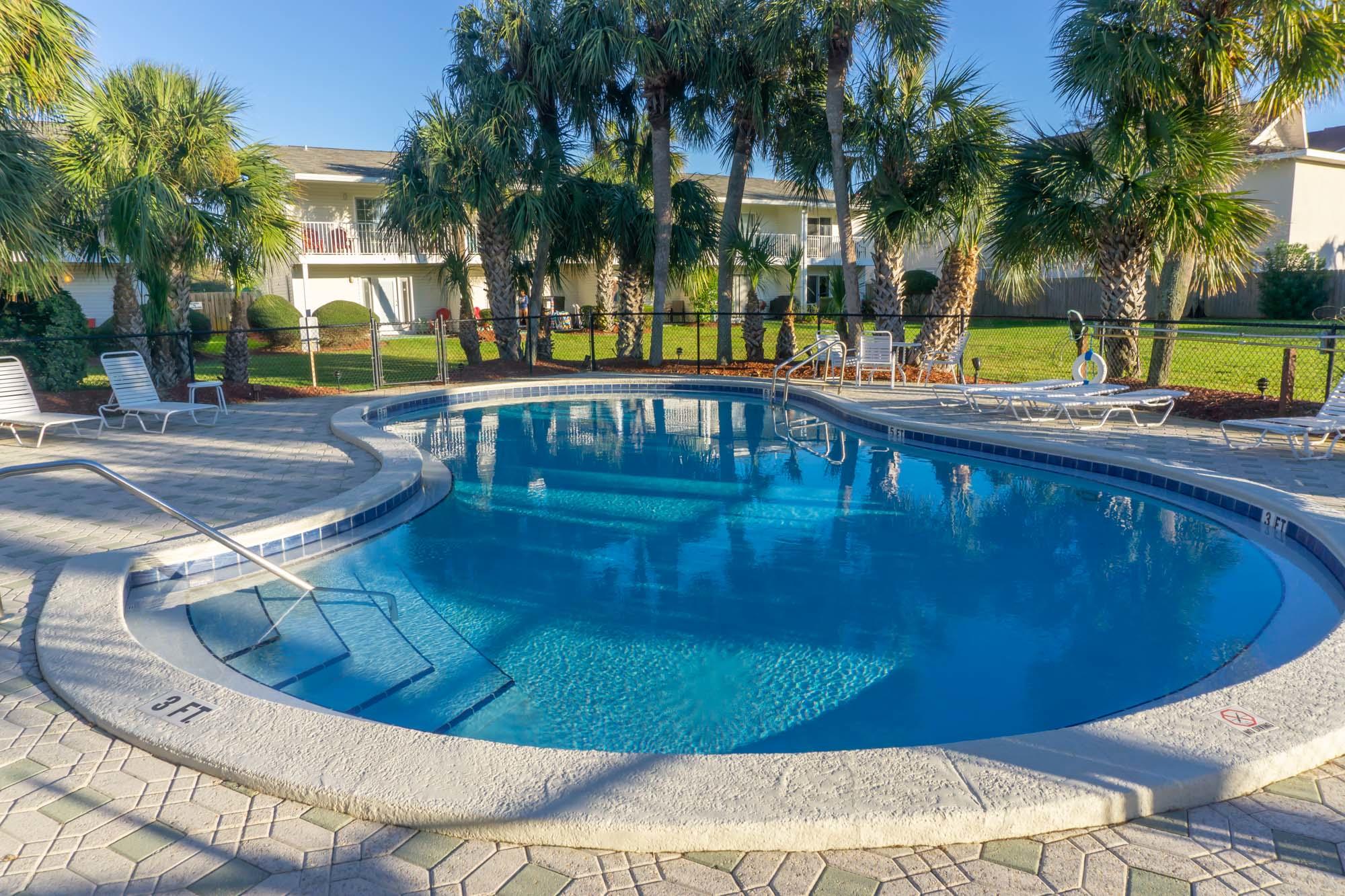 2000 Scenic Gulf Drive, Unit 5 Miramar Beach, FL 32550 - Photo 34 of 54 a view of swimming pool with a patio