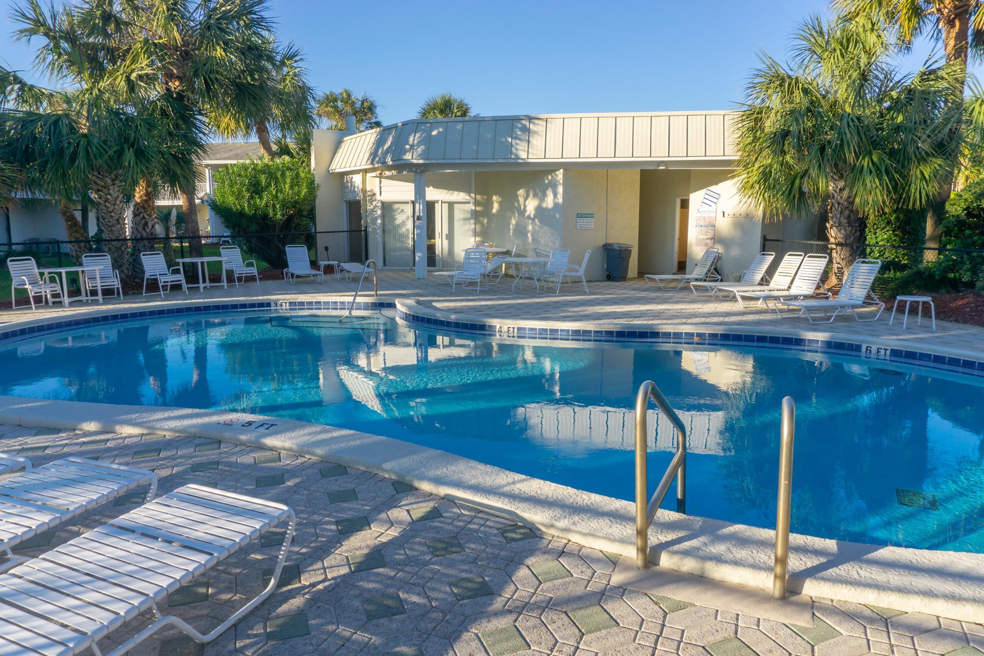 2000 Scenic Gulf Drive, Unit 5 Miramar Beach, FL 32550 - Photo 36 of 54 a view of a house with swimming pool