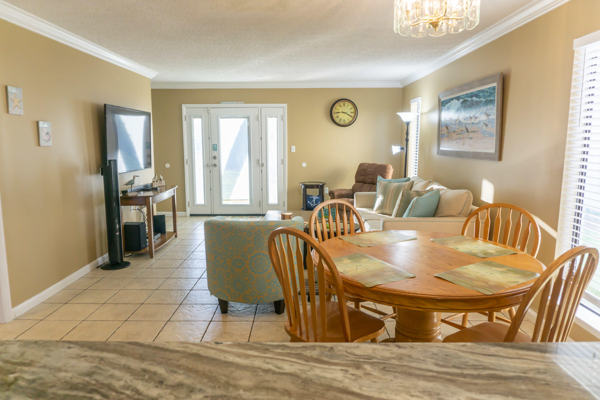 2000 Scenic Gulf Drive, Unit 5 Miramar Beach, FL 32550 - Photo 7 of 54 a view of a dining room with furniture and wooden floor