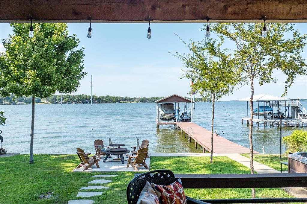 309 Shore Line Drive Tool, TX 75143 - Photo 19 of 23 a view of a lake from a yard