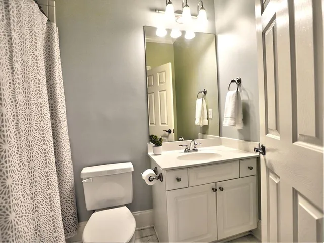 a kitchen with lots of counter top space and chairs
