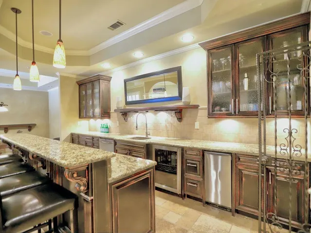 a bathroom with a toilet sink and shower