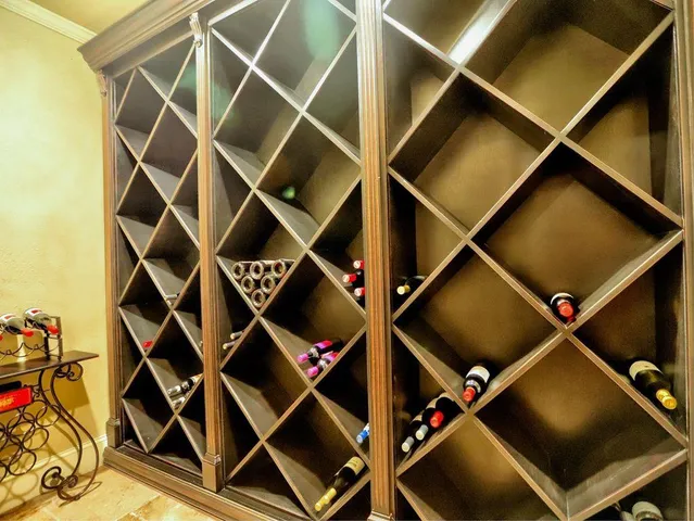 a backyard of a house with lots of green space and fountain