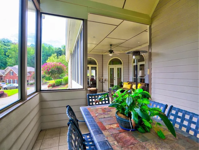 a front view of a house with wooden fence