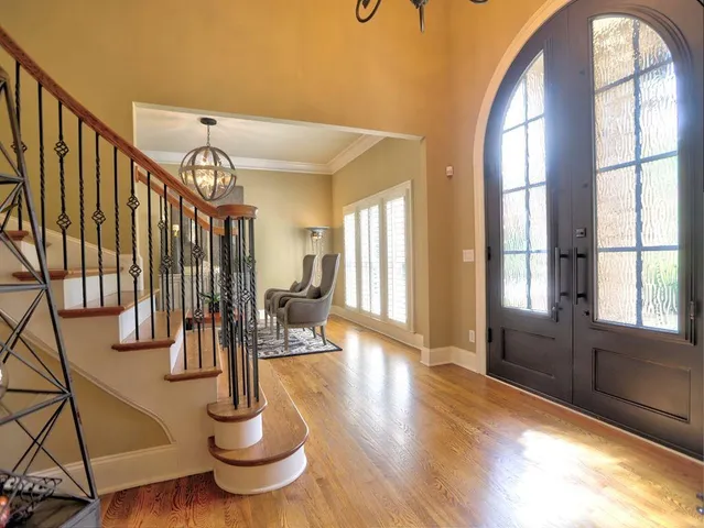 a work room with furniture and a rug