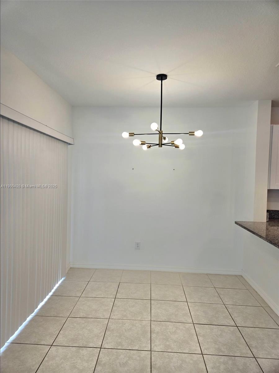 6346 Back Forty Loop Zephyrhills, FL 33541 - Photo 17 of 30 a view of empty room with a kitchen