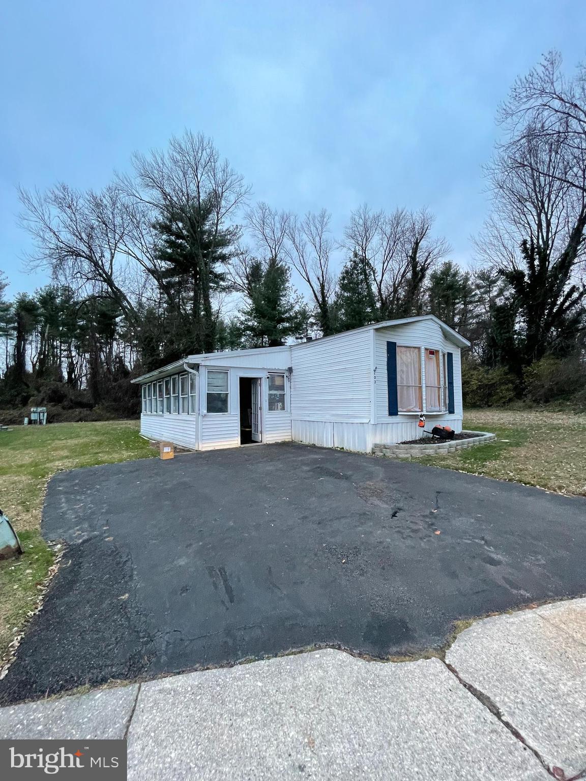 203 Shorewind Road, Unit 203 Bear, DE 19701 - Photo 2 of 20 a view of a house with a yard