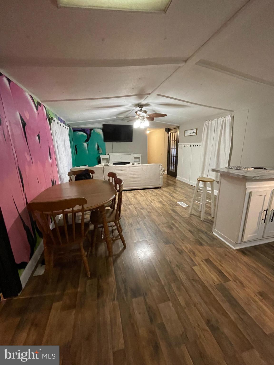 203 Shorewind Road, Unit 203 Bear, DE 19701 - Photo 3 of 20 a living room with furniture and a table