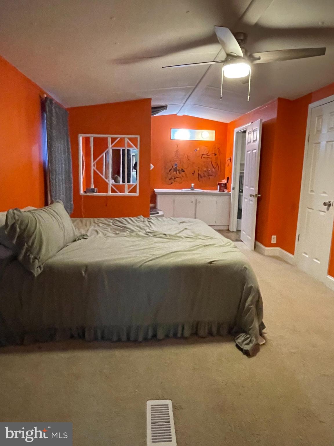 203 Shorewind Road, Unit 203 Bear, DE 19701 - Photo 5 of 20 a bed sitting in a bedroom next to a window