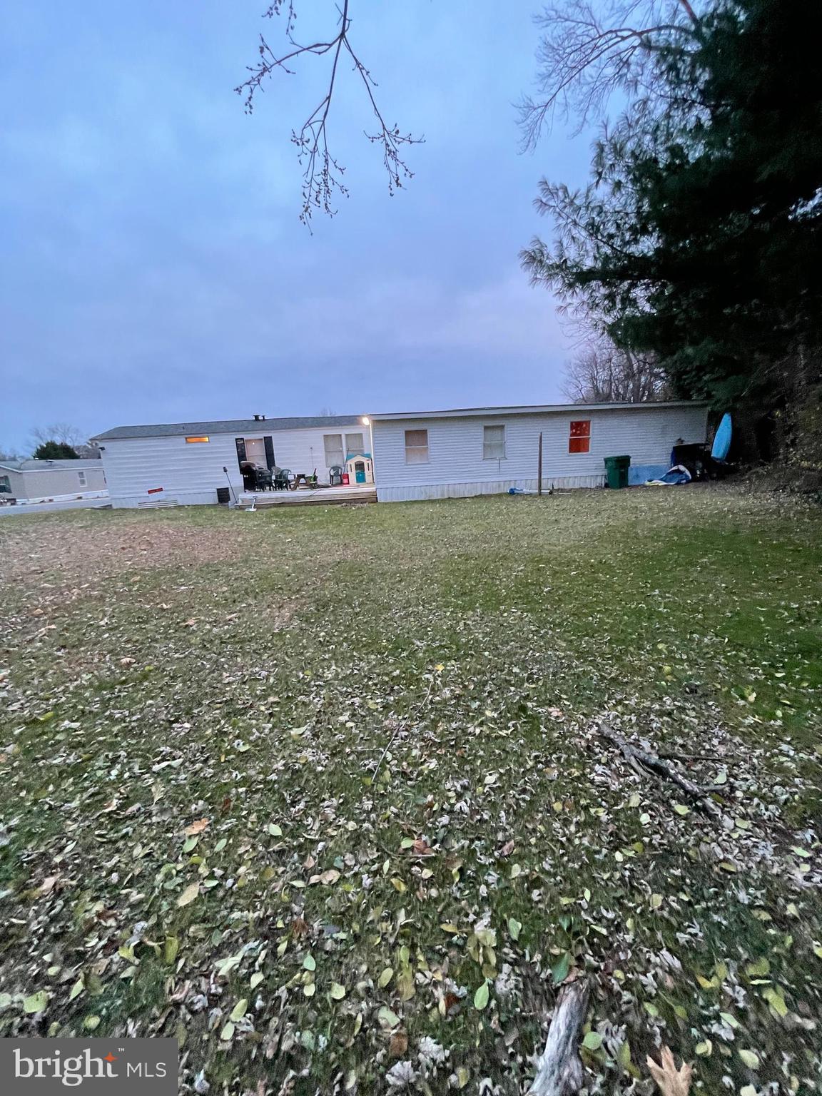 203 Shorewind Road, Unit 203 Bear, DE 19701 - Photo 7 of 20 a view of a large yard with a tree