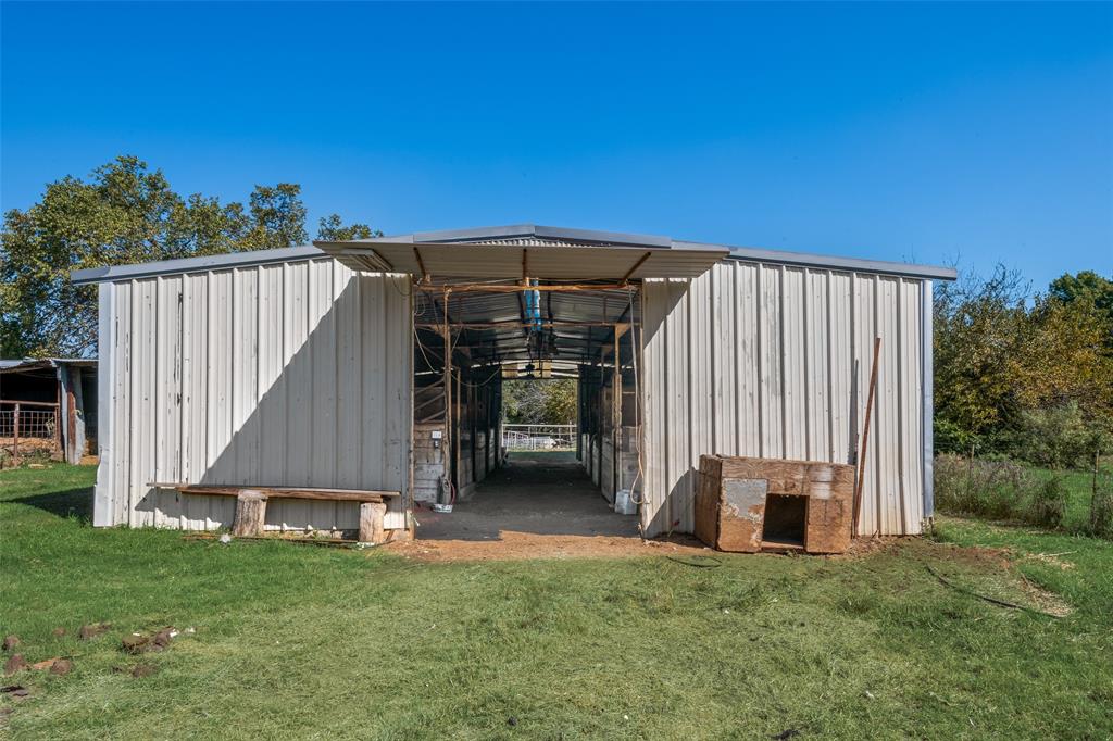 3092 North Trinity Street Decatur, TX 76234 - Photo 23 of 29 a view of a house with backyard