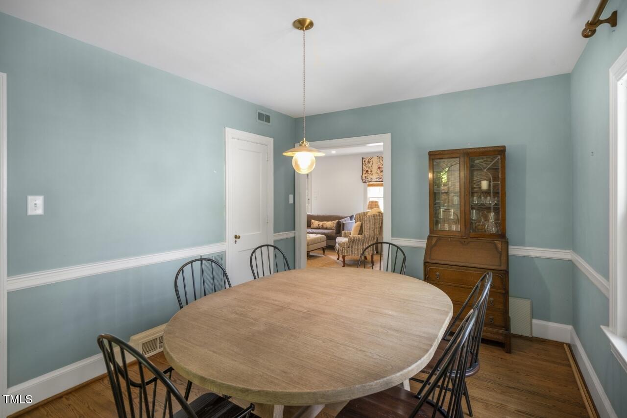 2726 Anderson Drive Raleigh, NC 27608 - Photo 18 of 45 a view of a dining room with furniture
