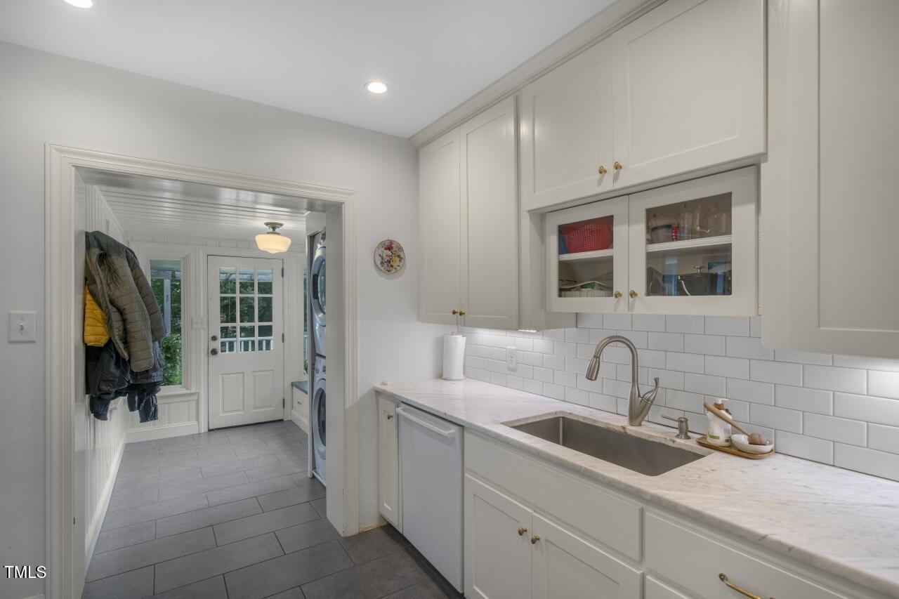 2726 Anderson Drive Raleigh, NC 27608 - Photo 21 of 45 a bathroom with a sink and a mirror