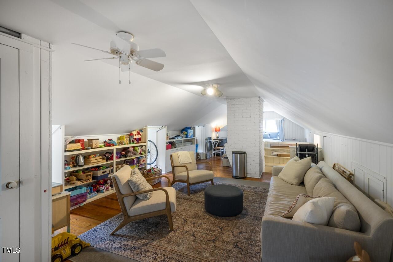 2726 Anderson Drive Raleigh, NC 27608 - Photo 32 of 45 a living room with furniture