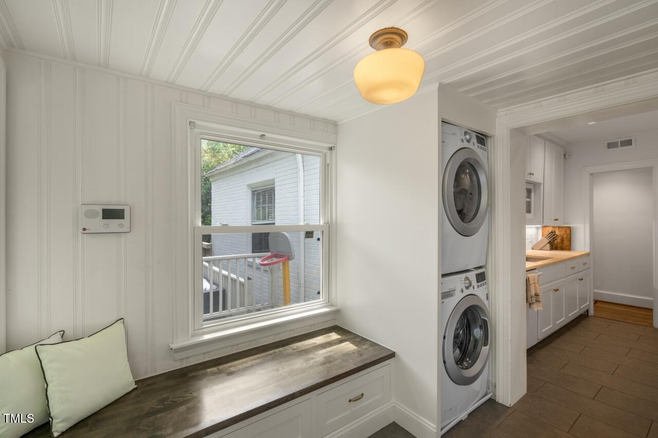 2726 Anderson Drive Raleigh, NC 27608 - Photo 35 of 45 a view of utility room with washer and dryer