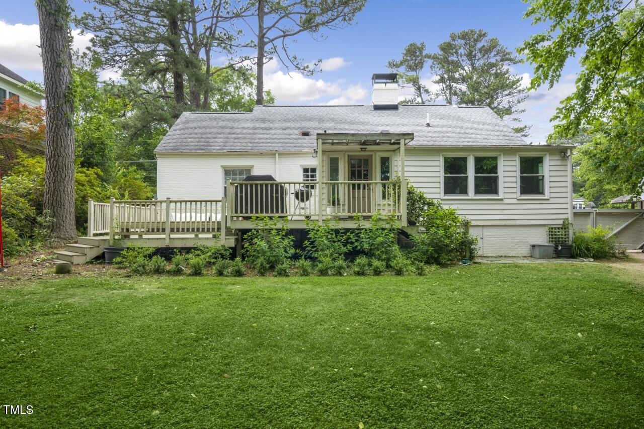2726 Anderson Drive Raleigh, NC 27608 - Photo 42 of 45 a front view of a house with a yard
