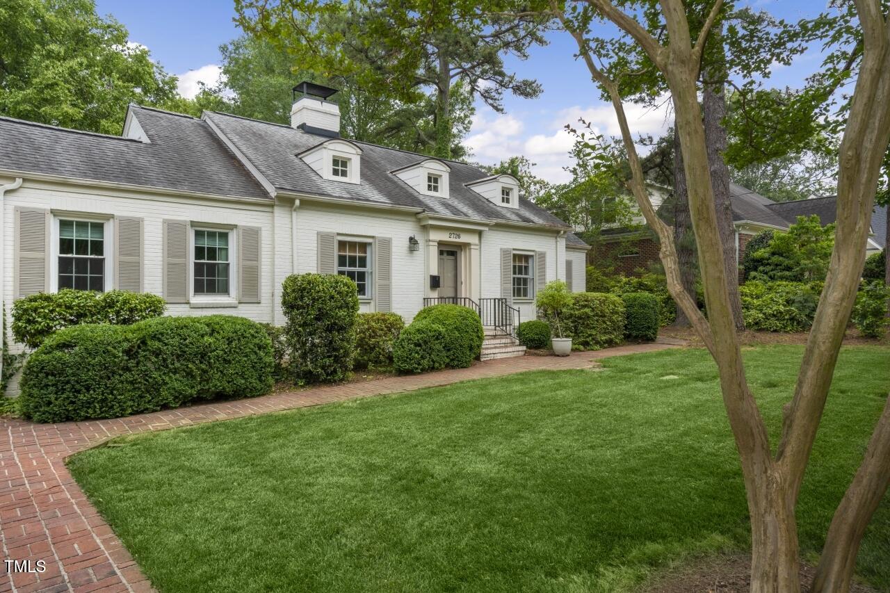 2726 Anderson Drive Raleigh, NC 27608 - Photo 6 of 45 a view of a yard in front of house
