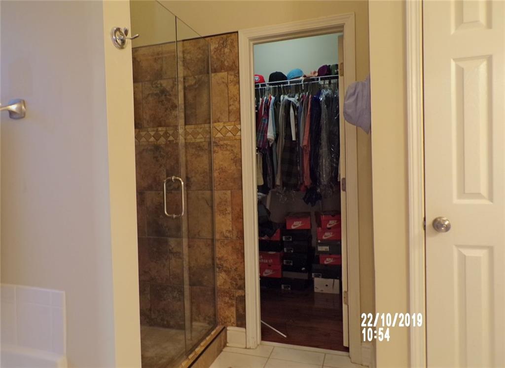 1035 Upchurch Road McDonough, GA 30252 - Photo 18 of 48 a bathroom with a shower