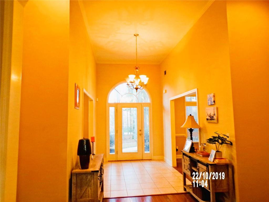 1035 Upchurch Road McDonough, GA 30252 - Photo 26 of 48 a bed room with a bed furniture and a window