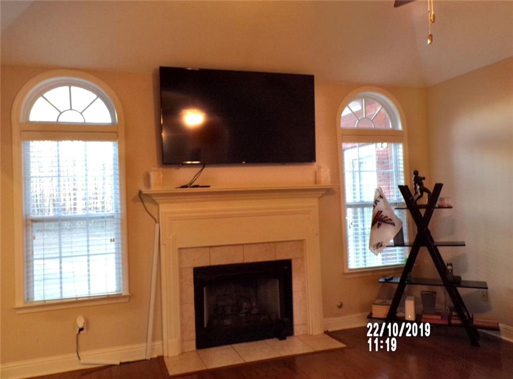 1035 Upchurch Road McDonough, GA 30252 - Photo 36 of 48 a view of a livingroom with furniture and a fireplace