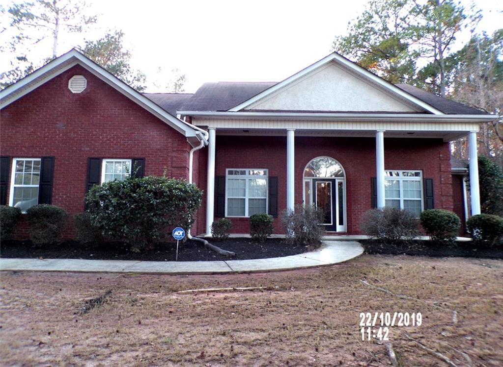 1035 Upchurch Road McDonough, GA 30252 - Photo 39 of 48 a front view of a house with porch