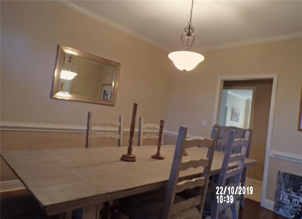1035 Upchurch Road McDonough, GA 30252 - Photo 4 of 48 a view of a dining room with furniture