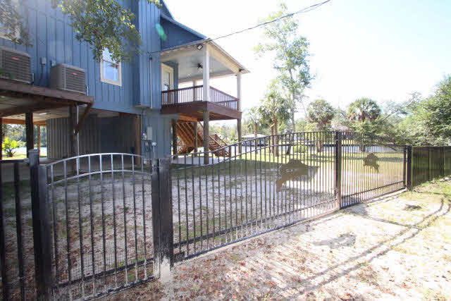 12900 Honey Rd Extension Summerdale, AL 36580 - Photo 3 of 44 Gated Entrance