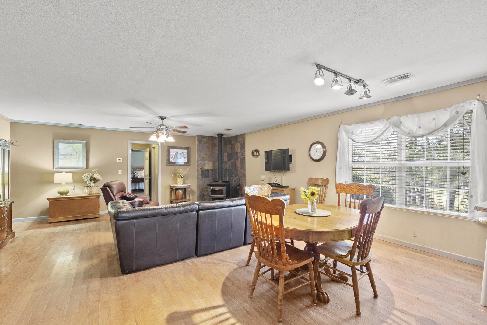 355 A Jernigan Road Portland, TN 37148 - Photo 8 of 47 a view of a dining room with furniture window and wooden floor