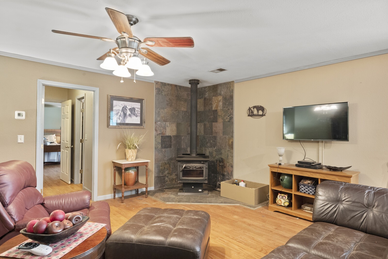 355 A Jernigan Road Portland, TN 37148 - Photo 9 of 47 a living room with furniture and a flat screen tv