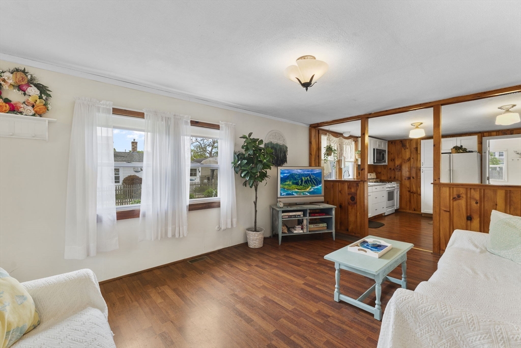 34 13th Street Wareham, MA 02558 - Photo 22 of 42 a living room with furniture and a window