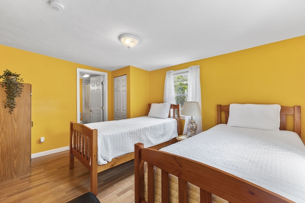 34 13th Street Wareham, MA 02558 - Photo 31 of 42 a bedroom with two beds and a table