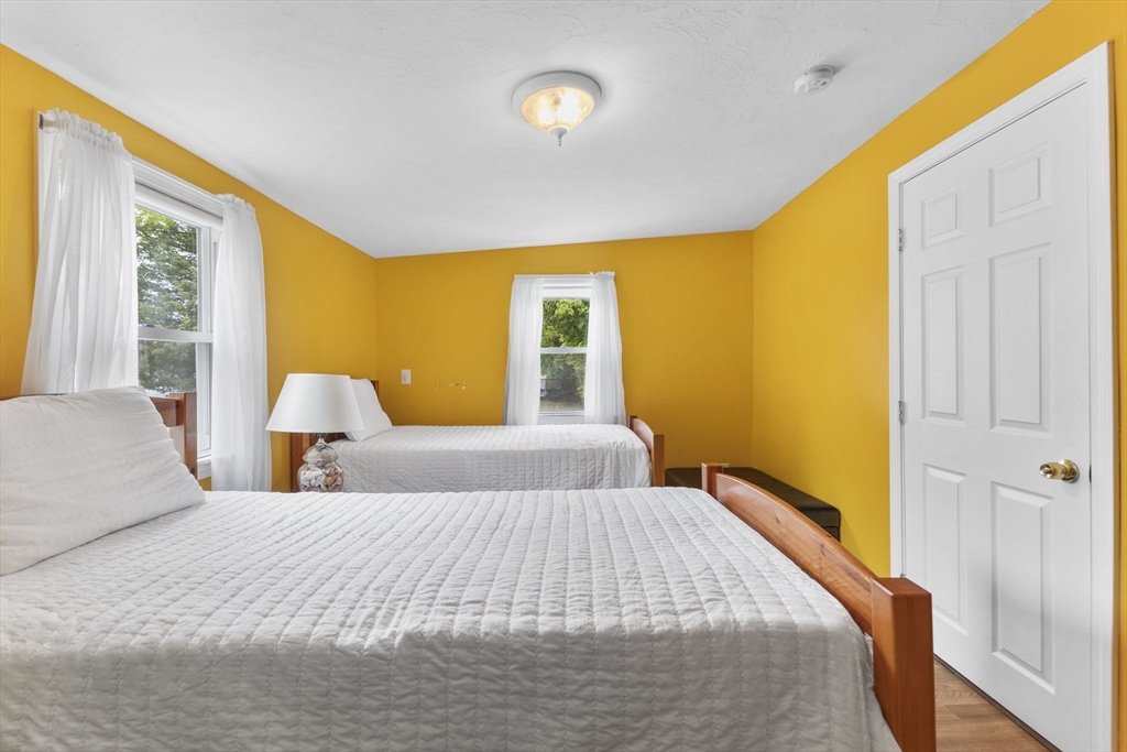 34 13th Street Wareham, MA 02558 - Photo 32 of 42 a bedroom with a bed and a window